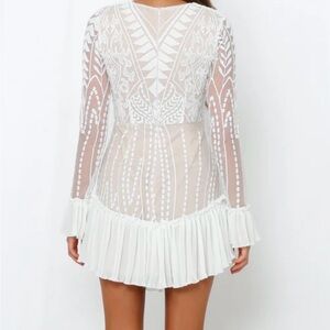 Elegant white embroidered Saints & Secrets Dress.